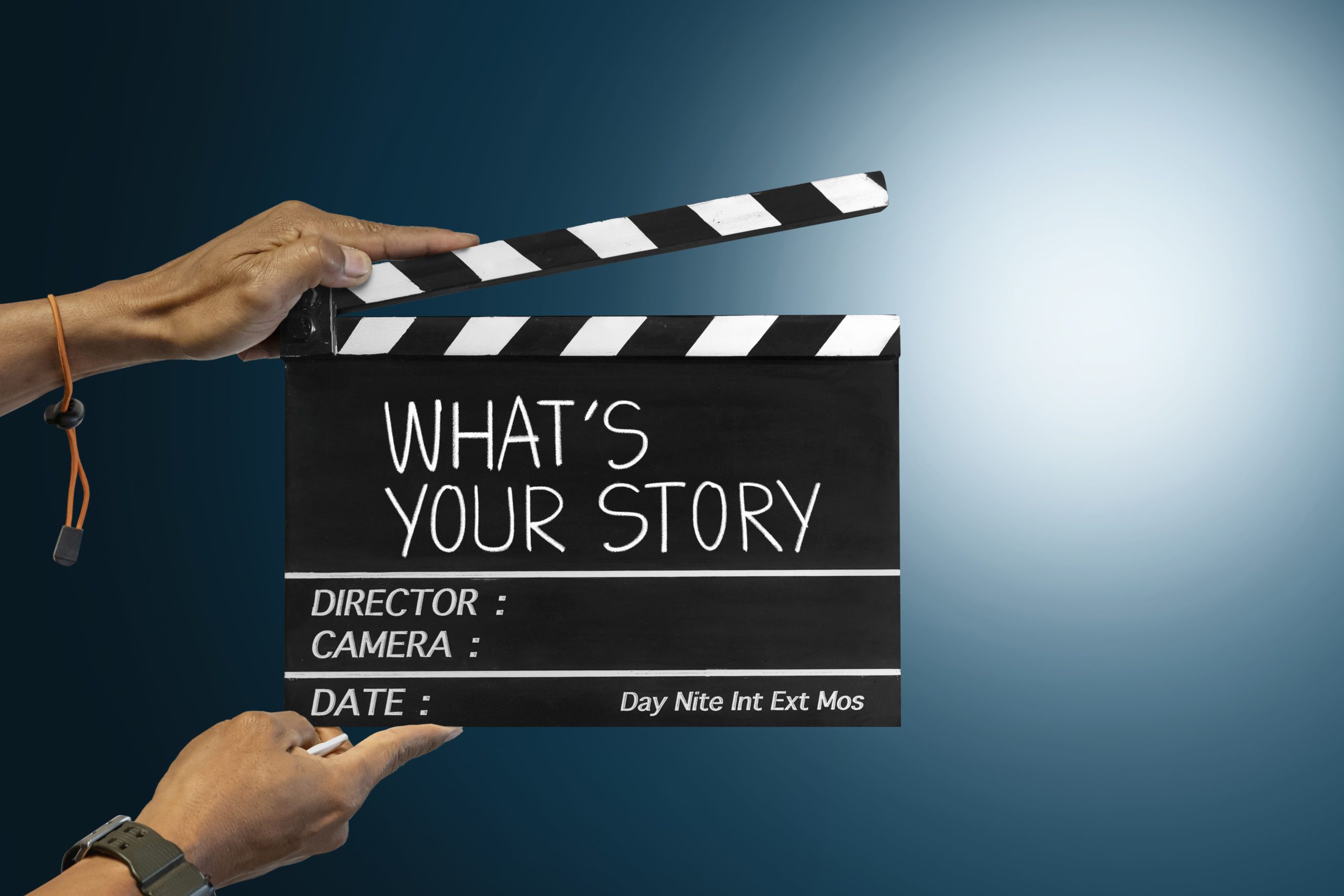 File Slate with What's Your Story written on it